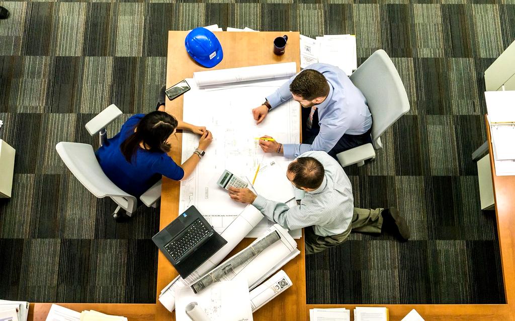 Primex team discussing strategy in a meeting room